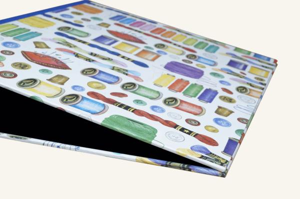 folder with motifs "needle and thread"